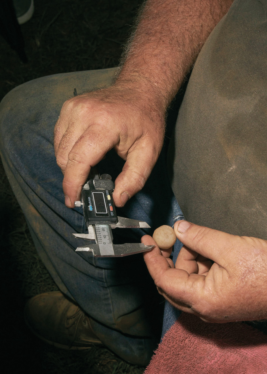 Paul Davis demonstrates how to carve marbles.