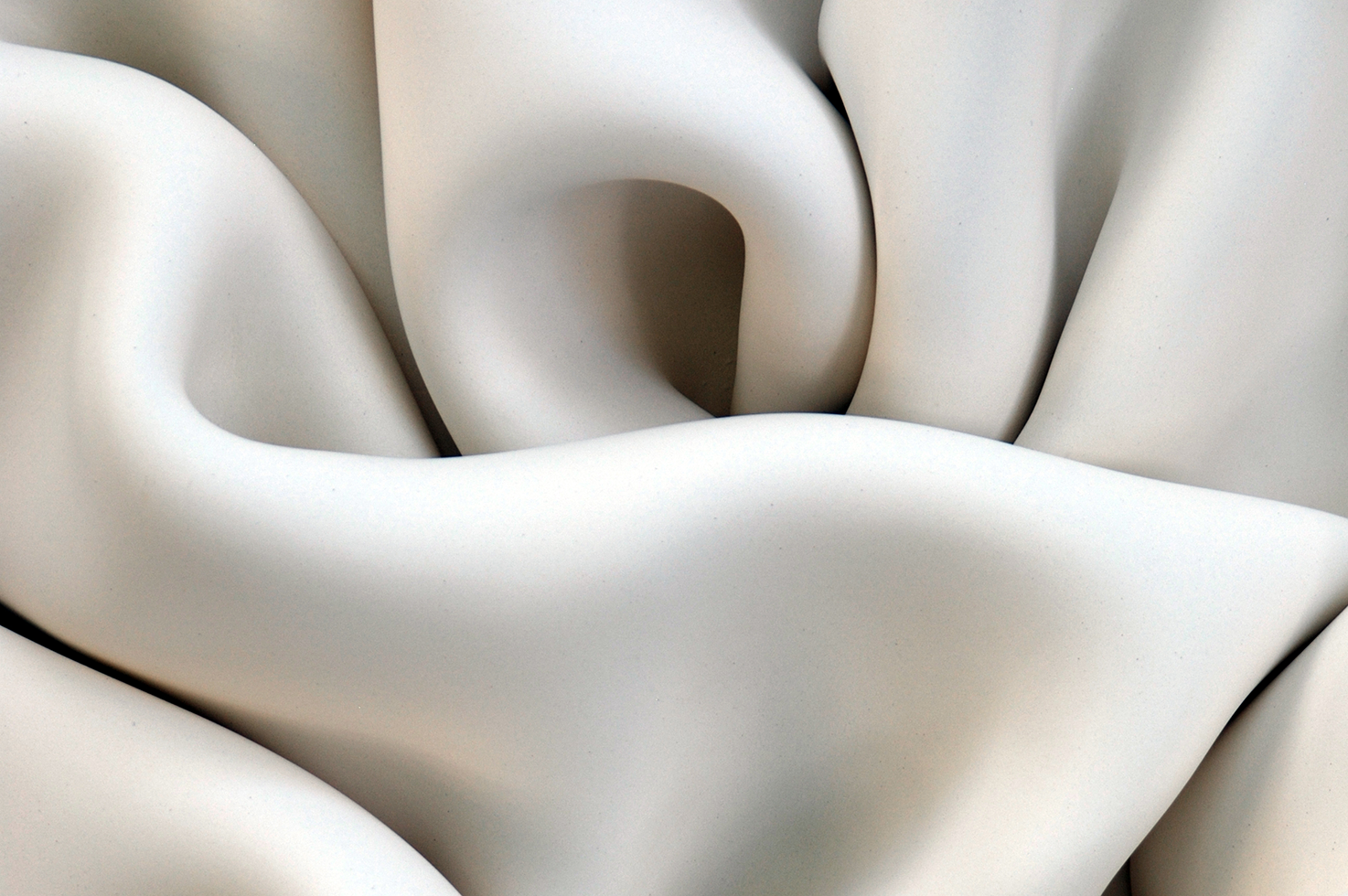 Detail of folded white clay sculpture