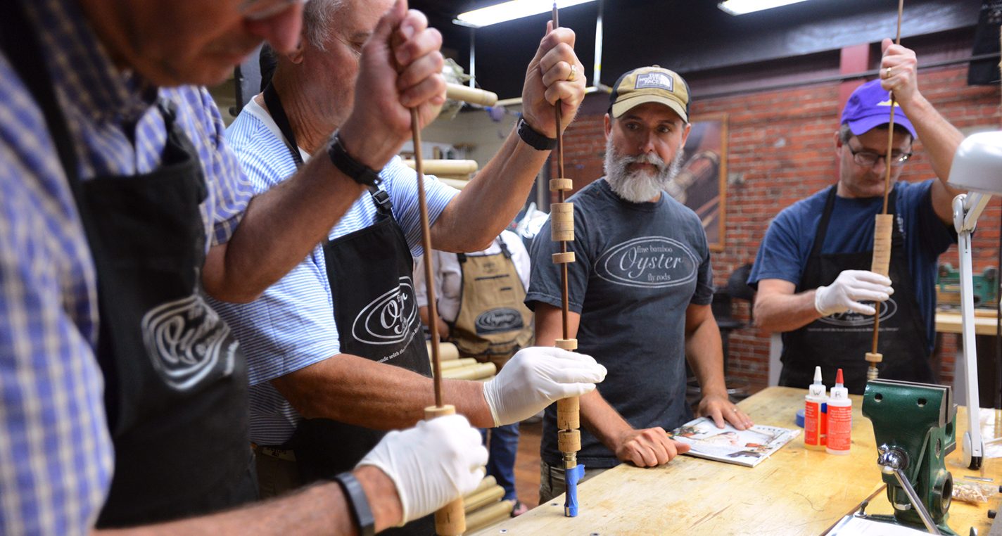 A group of students in an Oyster Bamboo fly rod making class.