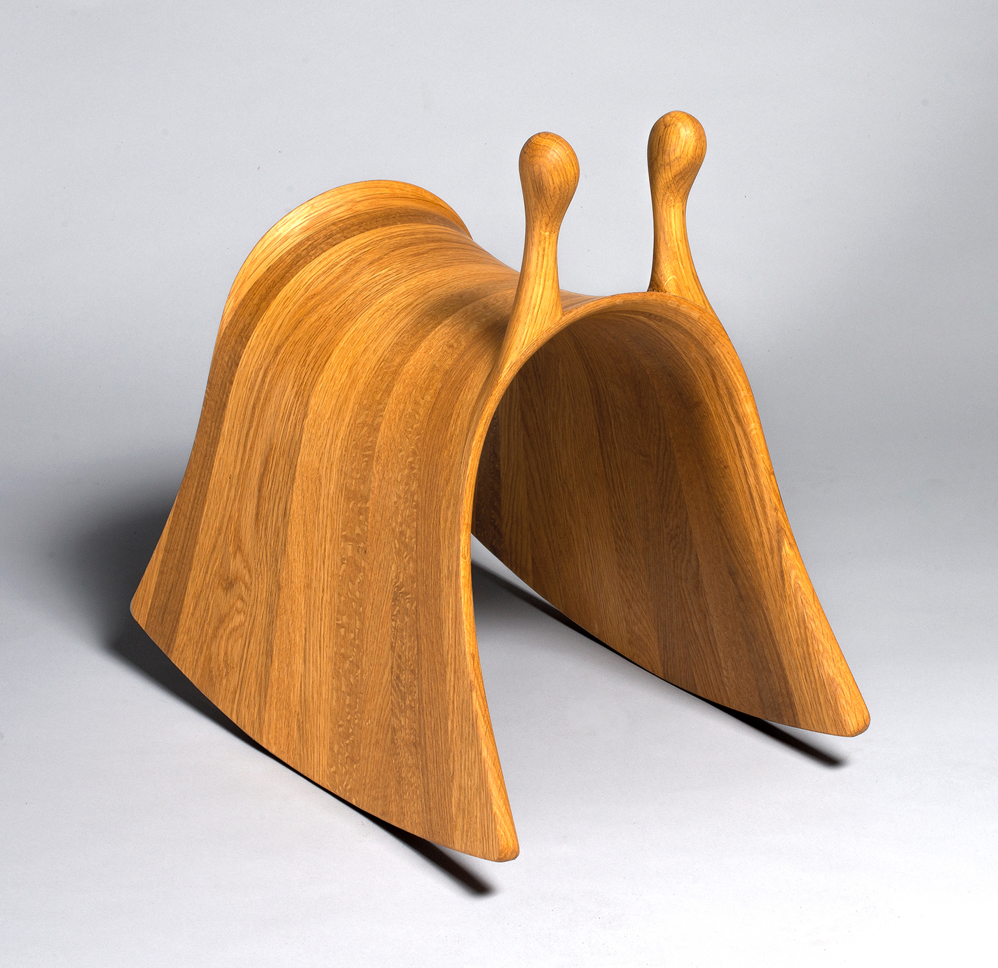 Wooden snail-shaped rocking chair
