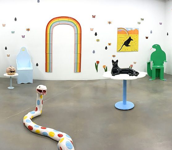 Bright animal sculptures in gallery space