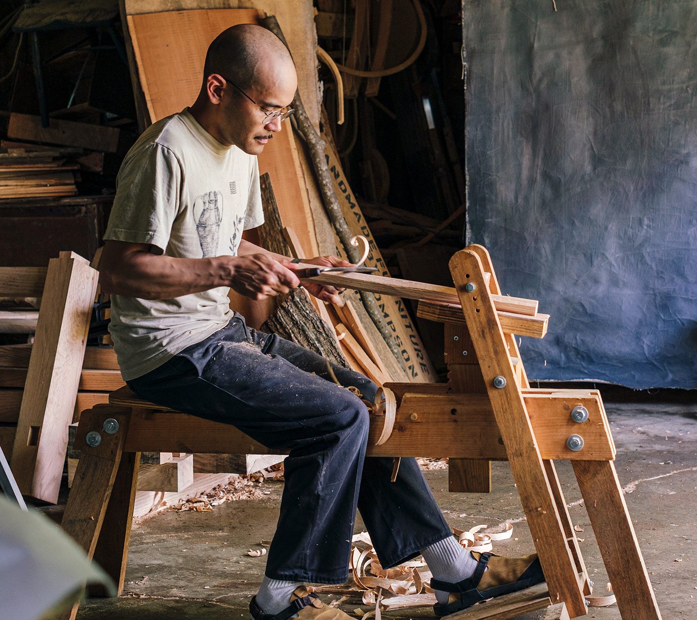 Thompson shaves a blank for the undercarriage of a chair.
