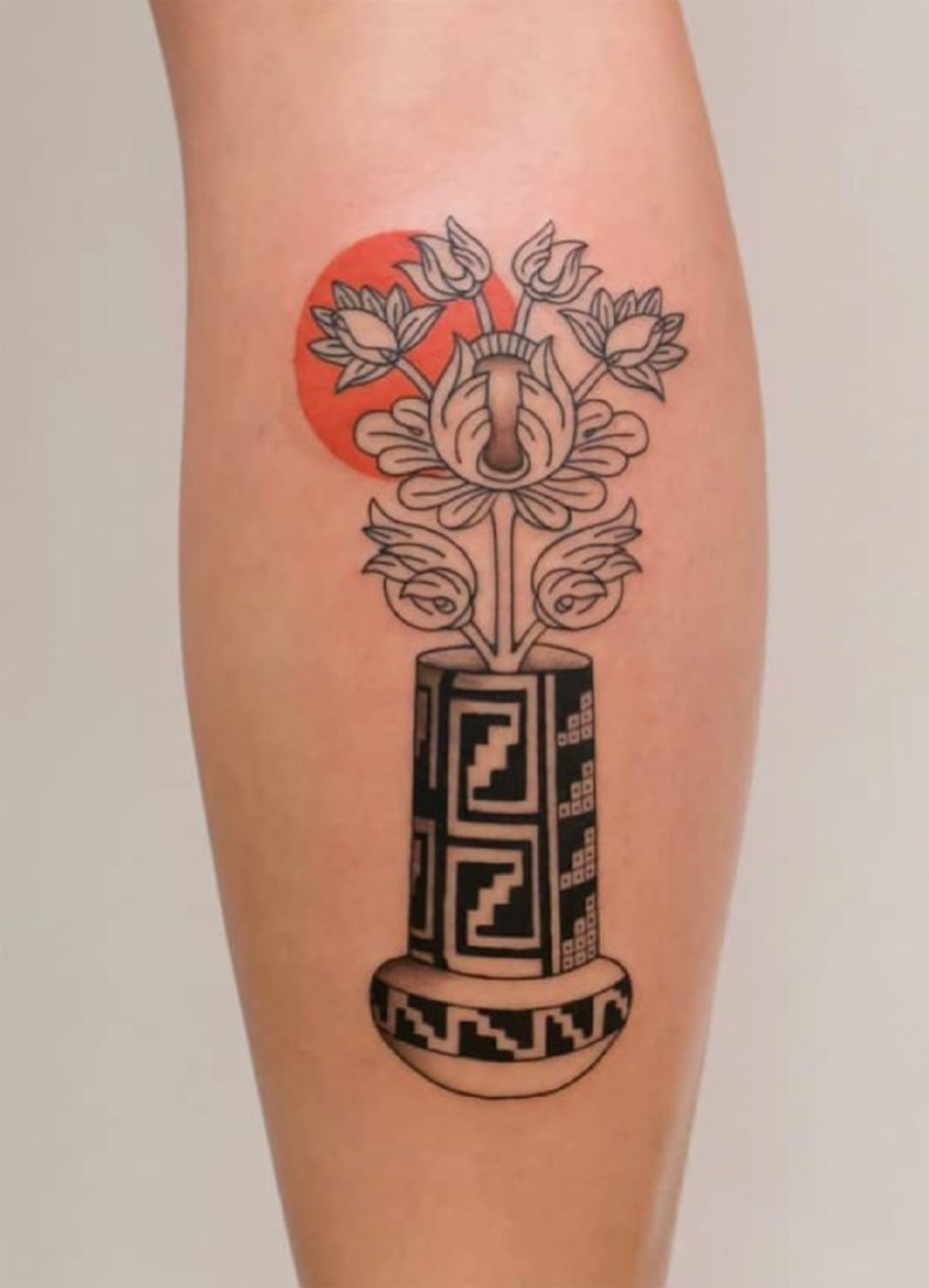 Tattoo of vase with flowers